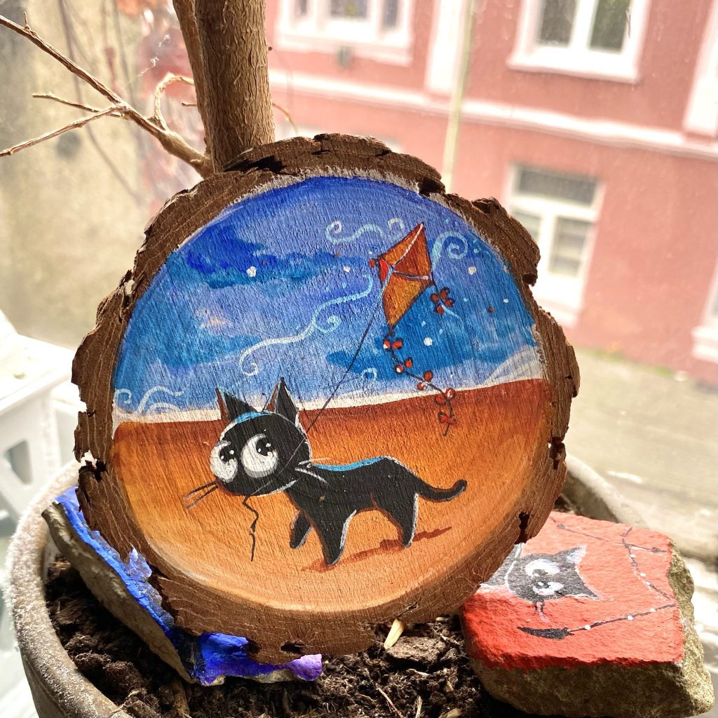 Holzscheibe handbemalt „Drachenfliegen”