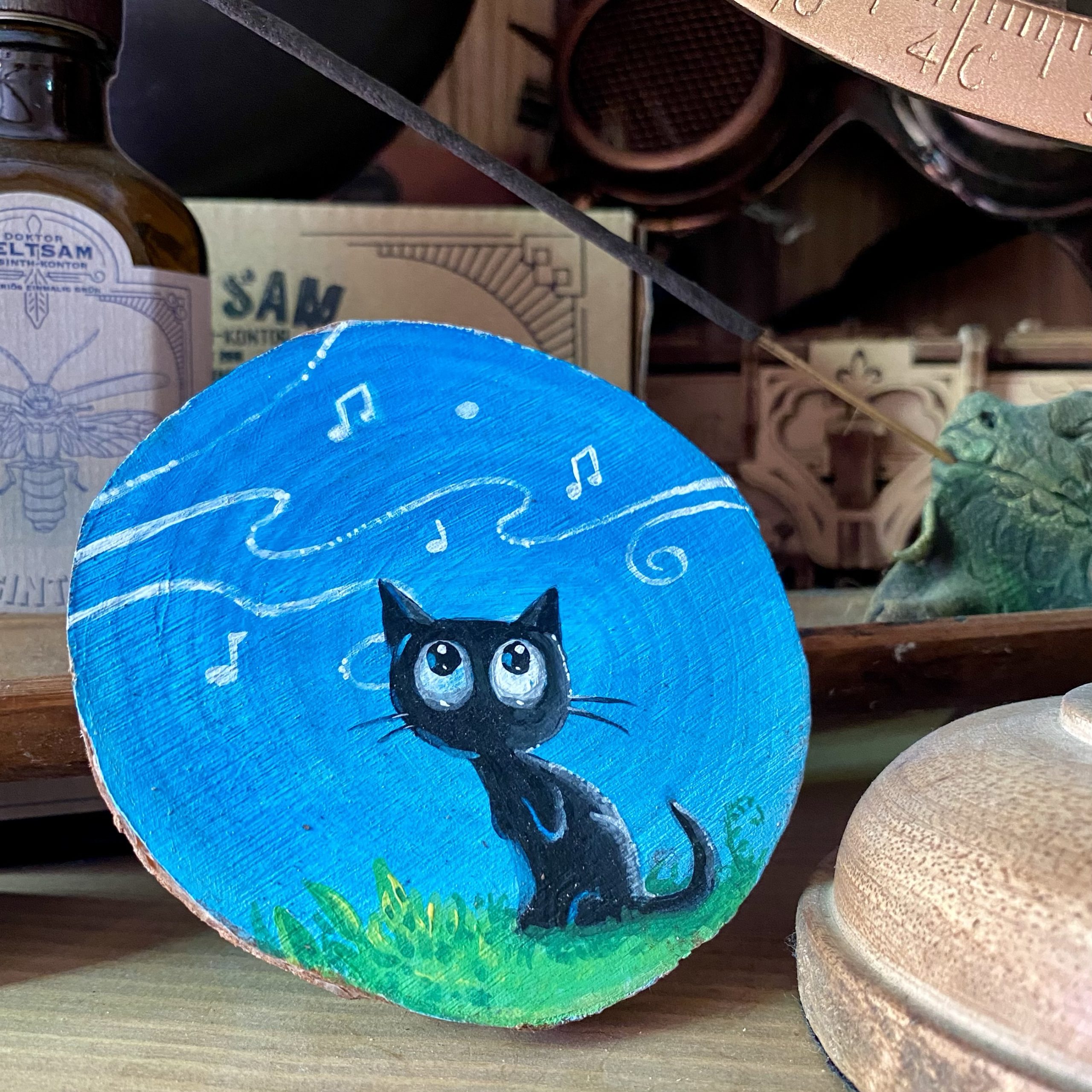 Holzscheibe handbemalt „Musik des Windes ”